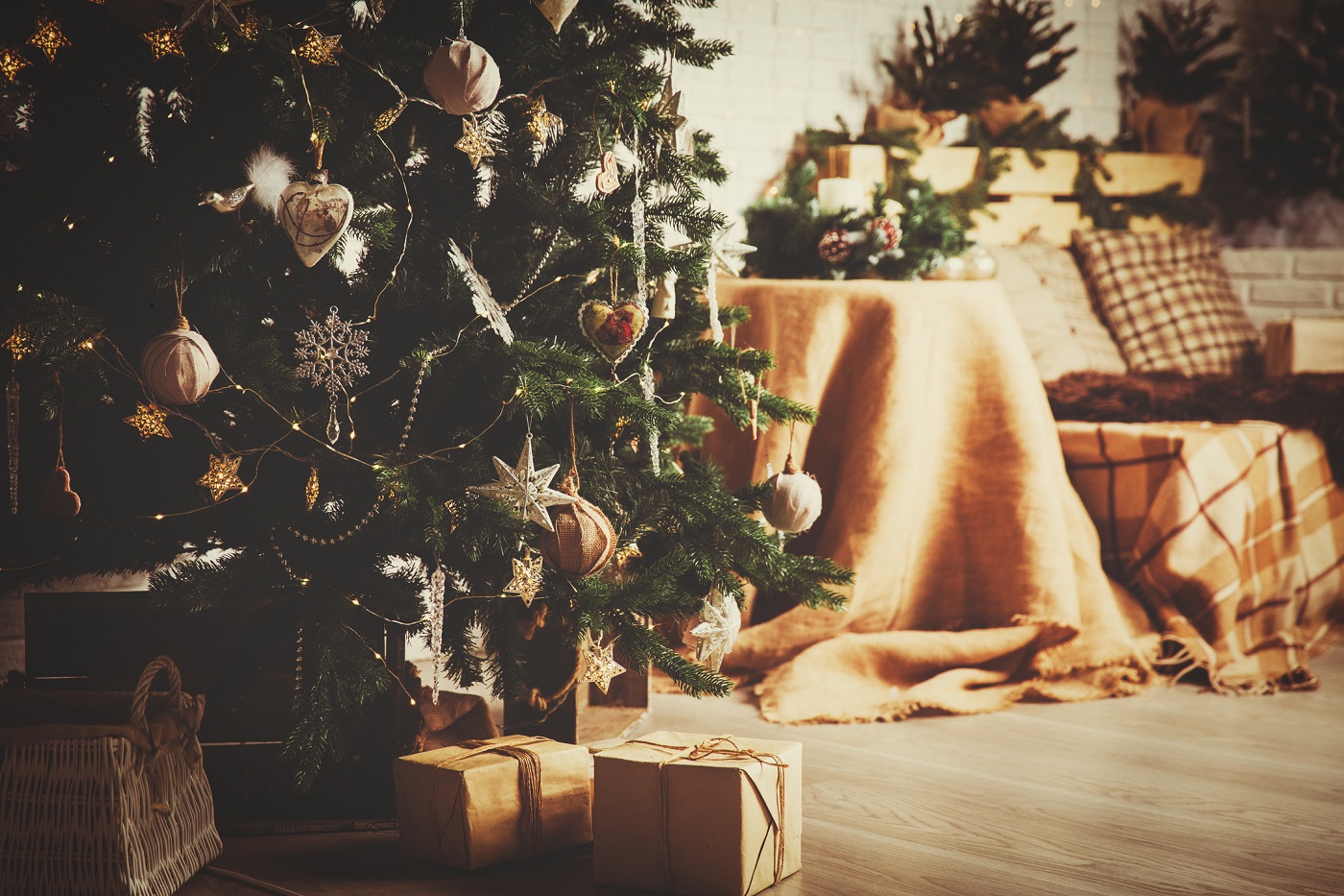 Christmas tree and presents in decorated living room
