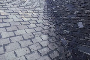 Worn asphalt shingles